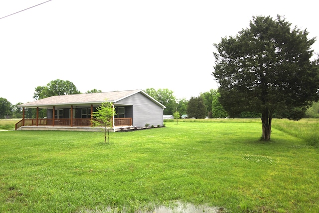 view of yard featuring a porch