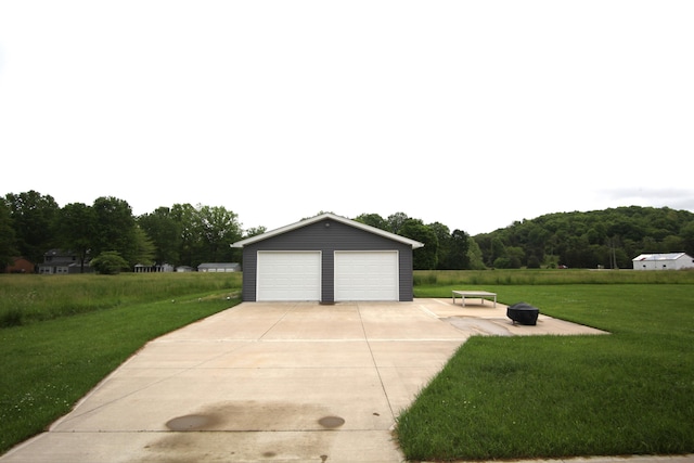 garage featuring a yard