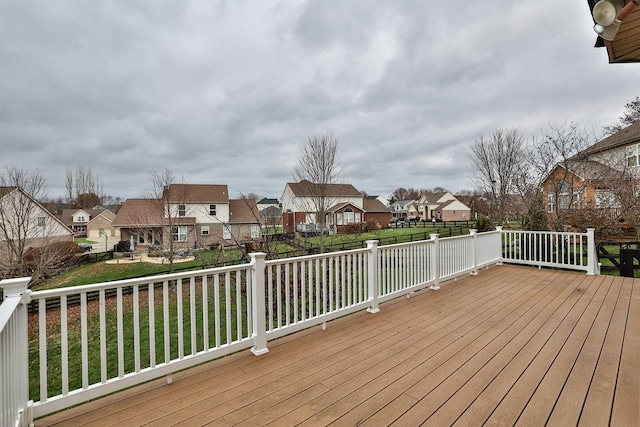 wooden deck with a yard