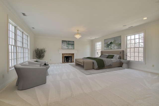 bedroom featuring ornamental molding and carpet flooring