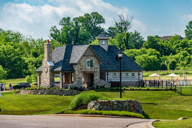 view of front of home with a front lawn