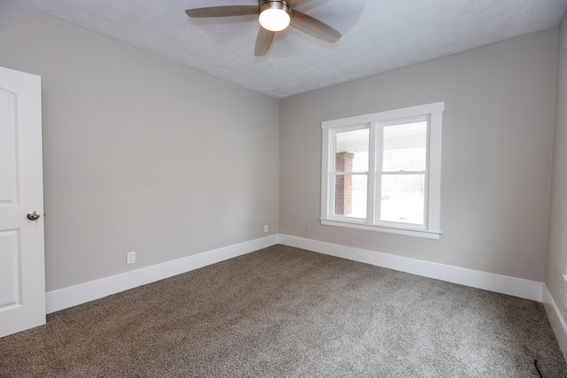 unfurnished room featuring carpet flooring, ceiling fan, and a textured ceiling