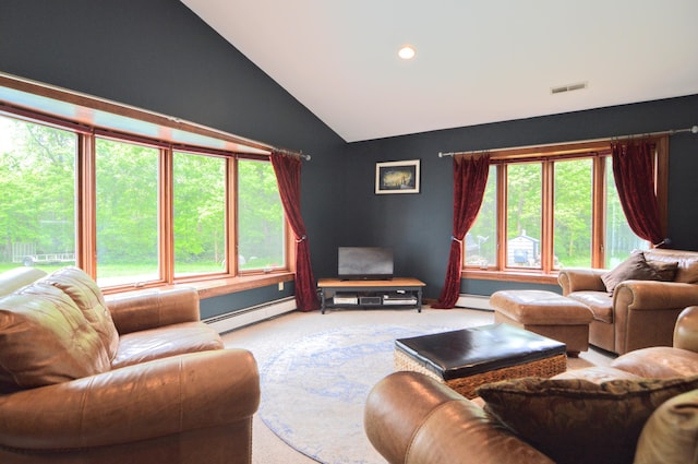 carpeted living room featuring lofted ceiling and a baseboard heating unit