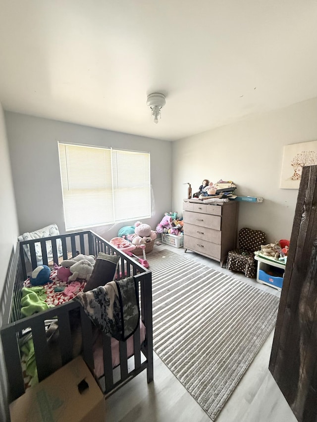 bedroom featuring light hardwood / wood-style floors