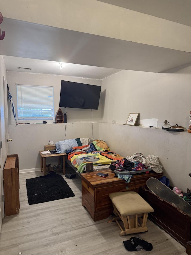 bedroom featuring light hardwood / wood-style flooring