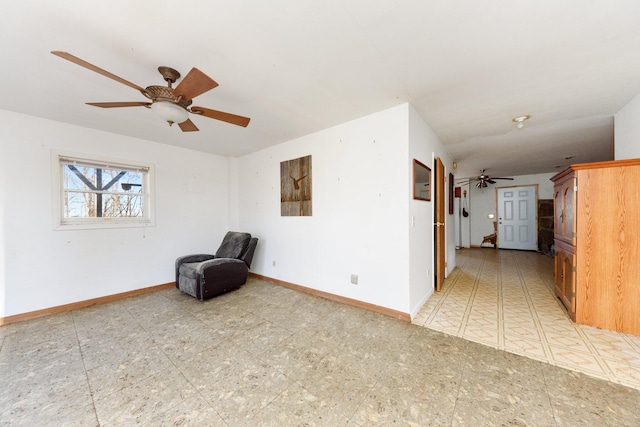 unfurnished room featuring ceiling fan