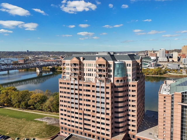 birds eye view of property with a water view