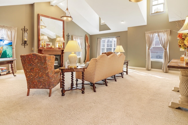 living area featuring light colored carpet and lofted ceiling with beams