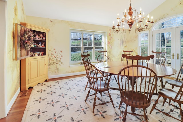 dining room featuring french doors and hardwood / wood-style flooring