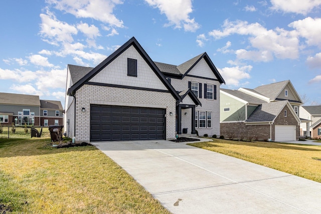 view of front facade featuring a garage and a front yard