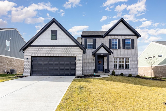 view of front of home with a front yard, a garage, and central AC unit