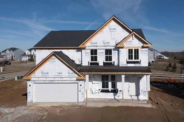 property under construction with a garage