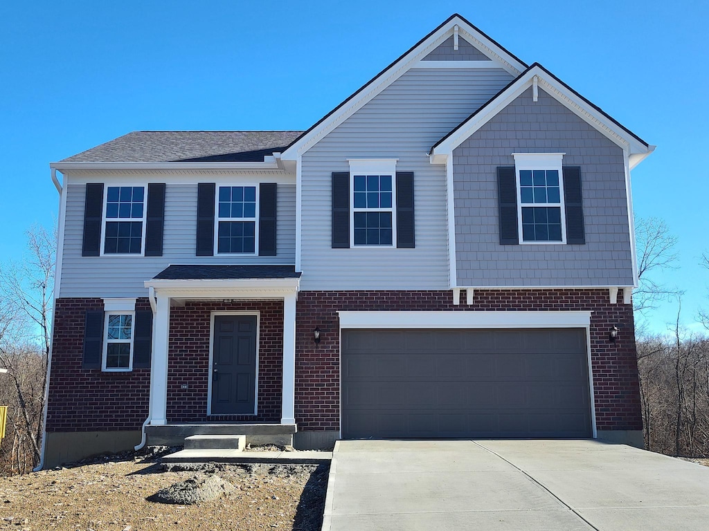 view of front of property featuring a garage