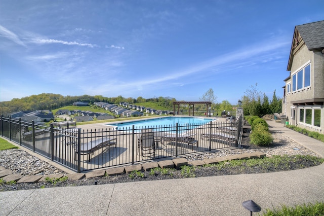 view of pool featuring a pergola and a patio