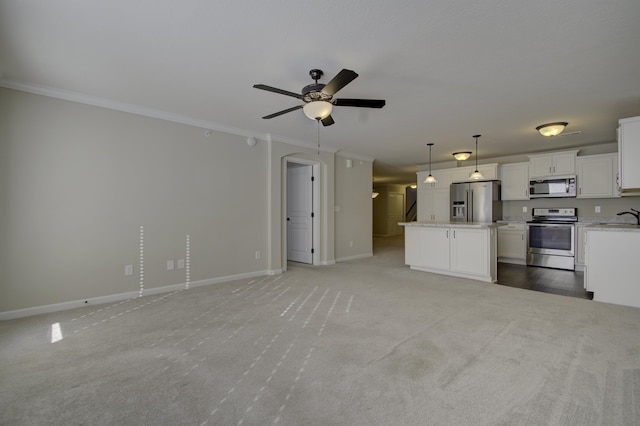 unfurnished living room with light colored carpet, ceiling fan, ornamental molding, and sink