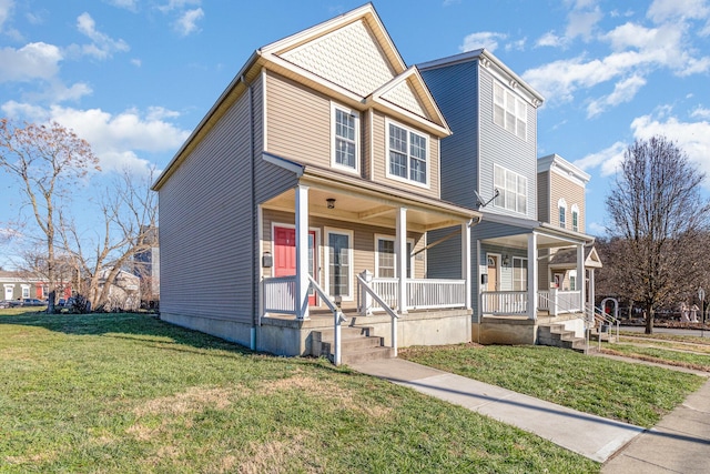 view of front of property featuring a front yard and a porch