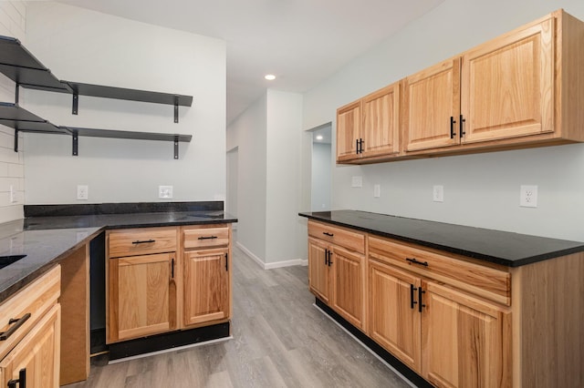 kitchen with light hardwood / wood-style floors