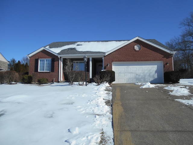 single story home with a garage