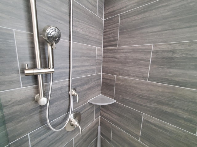 bathroom view of tiled shower