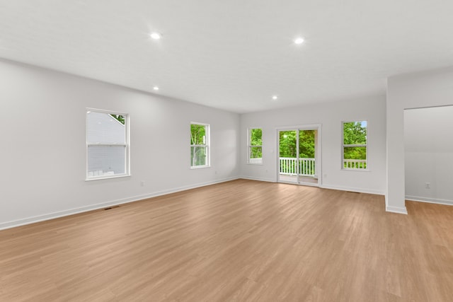2516 Winners Post Way, Burlington, KY 41005 - unfurnished room featuring baseboards, light wood-type flooring, and recessed lighting