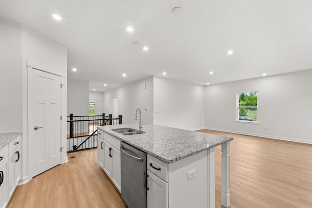 2516 Winners Post Way, Burlington, KY 41005 - kitchen featuring stainless steel dishwasher, a sink, light wood-type flooring, plenty of natural light, and recessed lighting
