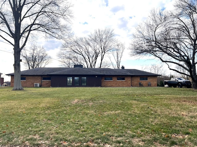 exterior space with a lawn