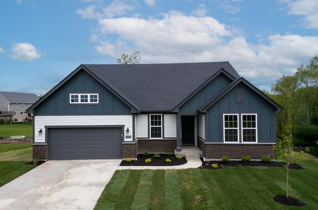 3850 Sherbourne Dr, Independence, KY 41051 - view of front of house with brick siding, board and batten siding, driveway, and a front lawn