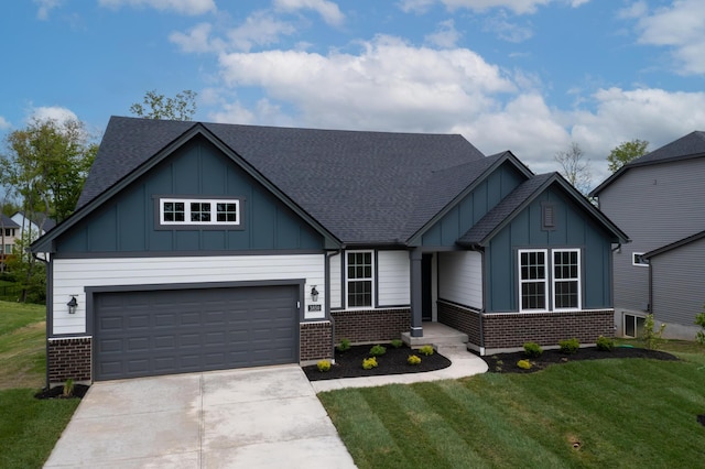 3850 Sherbourne Dr, Independence, KY 41051 - view of front facade with brick siding, board and batten siding, driveway, a shingled roof, and a front yard