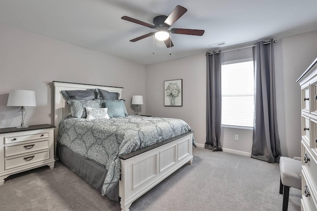 bedroom with ceiling fan and carpet flooring