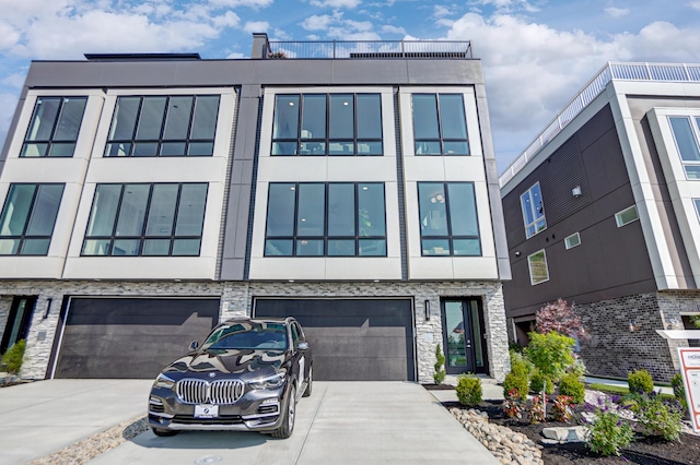 modern home featuring a garage