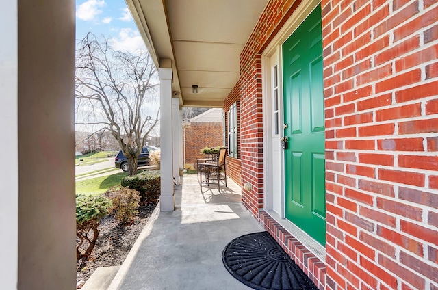 doorway to property with covered porch