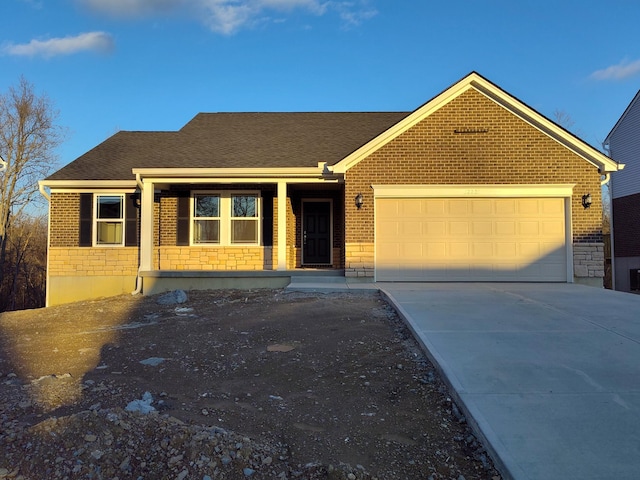 single story home featuring a garage