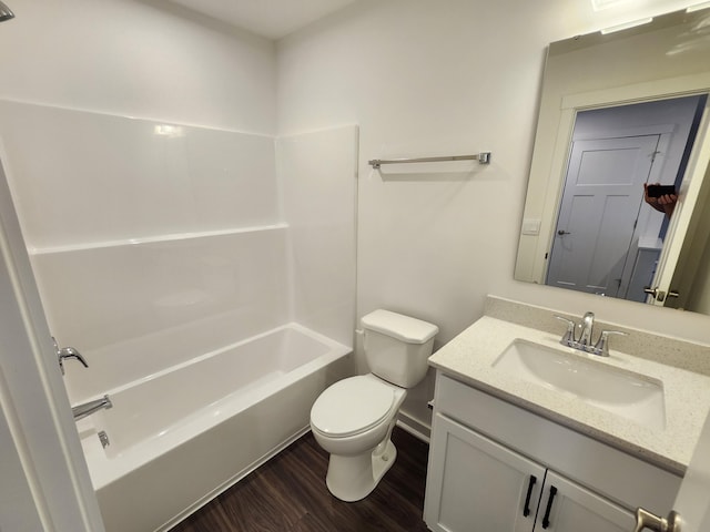 6566 Cannondale Dr, Burlington, KY 41005 - bathroom featuring wood finished floors, toilet, vanity, shower / bath combination, and baseboards