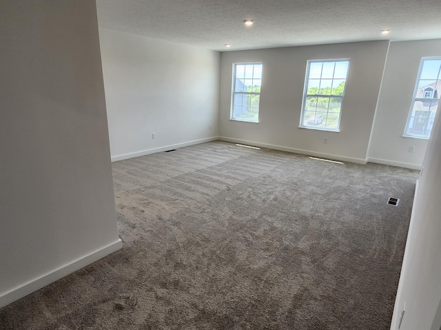 6566 Cannondale Dr, Burlington, KY 41005 - unfurnished room with carpet, baseboards, a textured ceiling, and recessed lighting