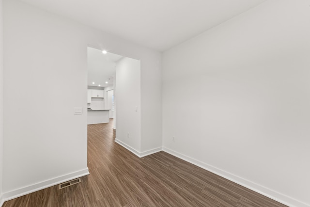 6566 Cannondale Dr, Burlington, KY 41005 - unfurnished room featuring baseboards, dark wood finished floors, and recessed lighting