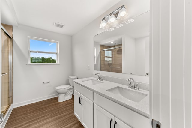 6566 Cannondale Dr, Burlington, KY 41005 - bathroom with a shower stall, double vanity, baseboards, and toilet