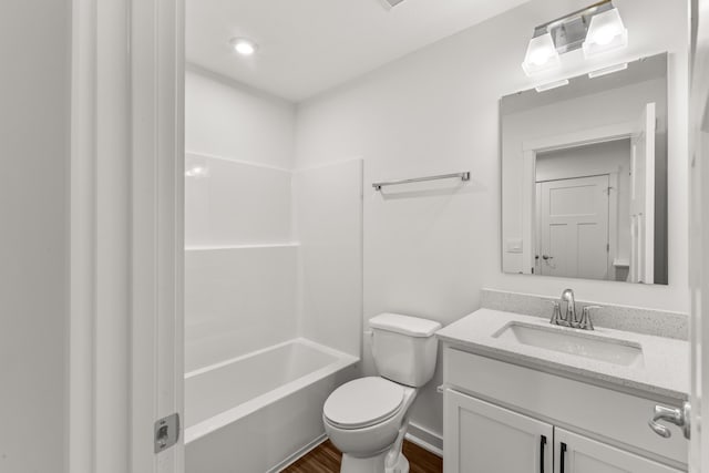 6566 Cannondale Dr, Burlington, KY 41005 - full bathroom featuring vanity, toilet, wood finished floors, and shower / washtub combination