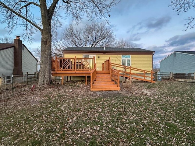 back of property with a deck