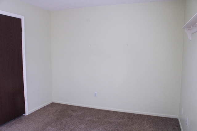 unfurnished room with carpet floors