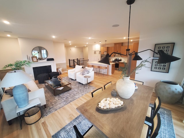 living room with light hardwood / wood-style flooring