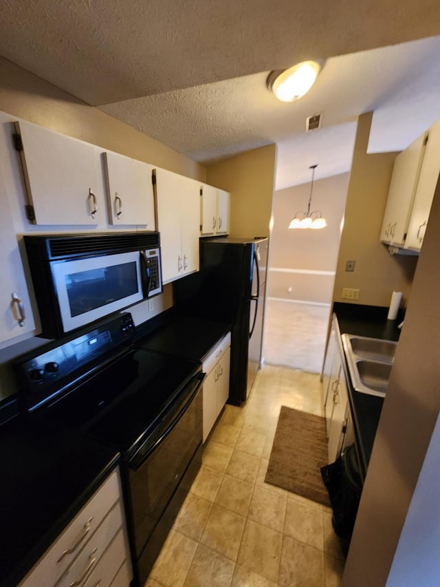 kitchen featuring a notable chandelier, white cabinets, sink, black electric range, and decorative light fixtures