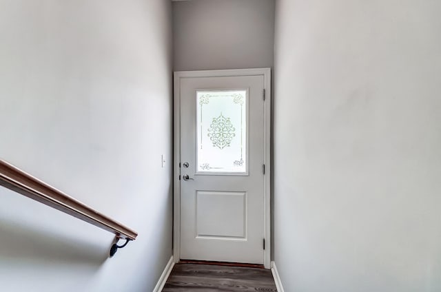 doorway to outside featuring dark hardwood / wood-style floors