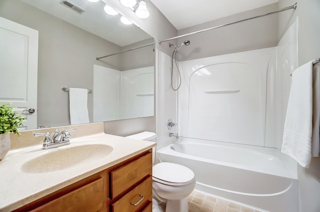 full bathroom with vanity, shower / bath combination, and toilet