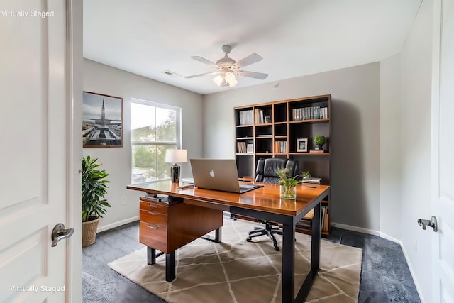 office area with ceiling fan and carpet floors