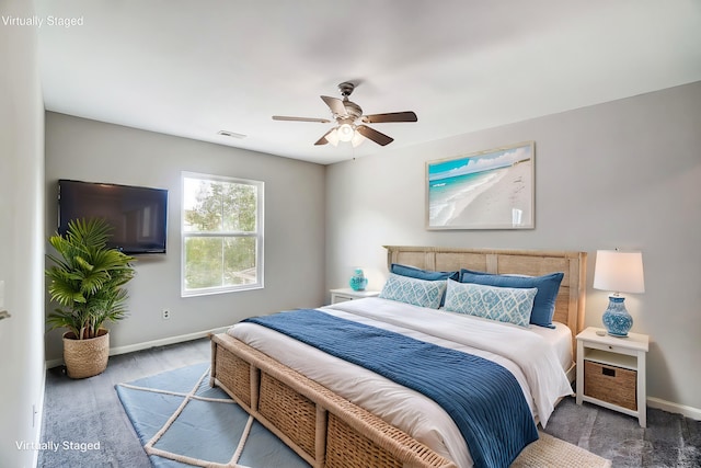 carpeted bedroom featuring ceiling fan