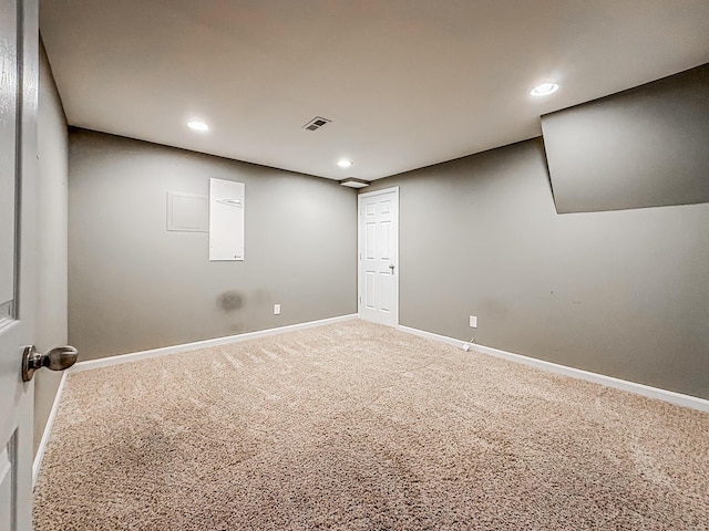 basement featuring carpet flooring