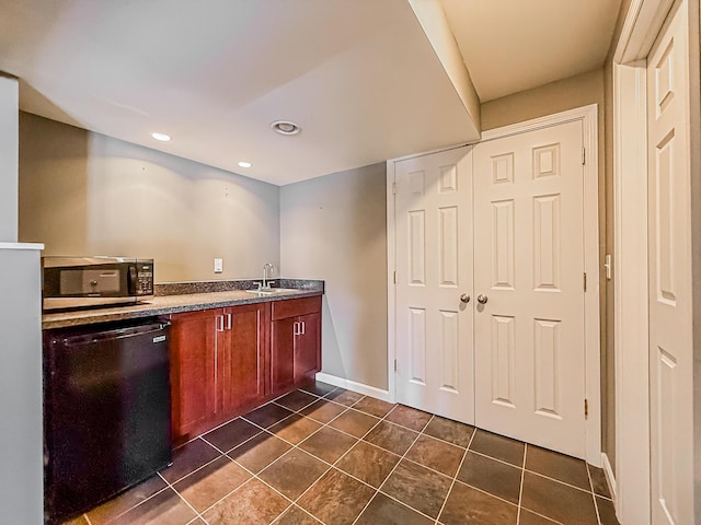 kitchen featuring sink and dishwasher