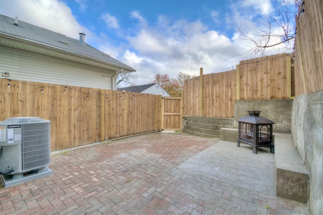 view of patio featuring central AC