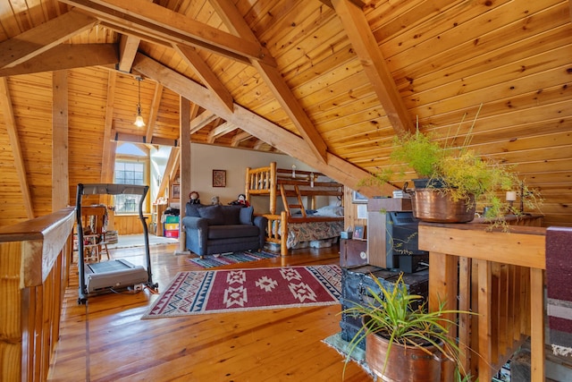 living area featuring wooden ceiling, vaulted ceiling with beams, and hardwood / wood-style flooring