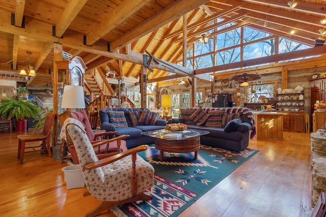 living room featuring wooden ceiling, light wood finished floors, and beam ceiling